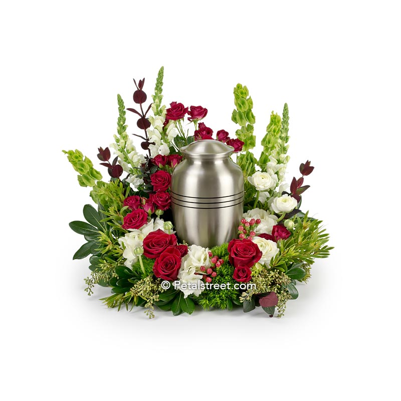 Flower arrangement for an Urn of ashes with red Roses, white Alstroemeria, Carnations, and green accents by Petal Street Flower Company.