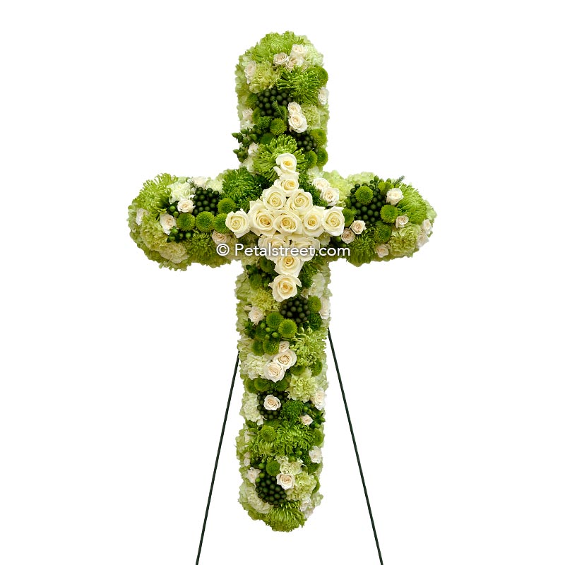 Irish funeral cross with green and white flowers including Roses, Carnations, Green Trick, and Hydrangea.
