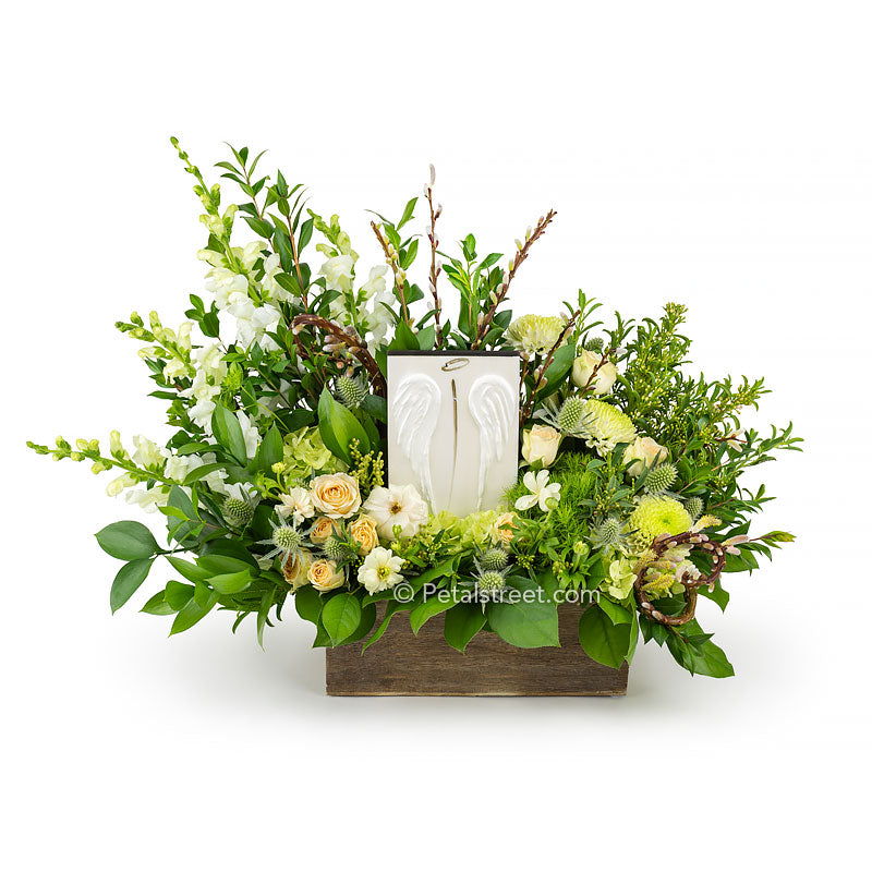 Sympathy flowers for delivery with Angel Wings in Point Pleasant NJ. Flowers include white Roses, hydrangea, Snapdragons, Thistle, and curly Willow all arranged in a box with the keepsake custom art piece included.
